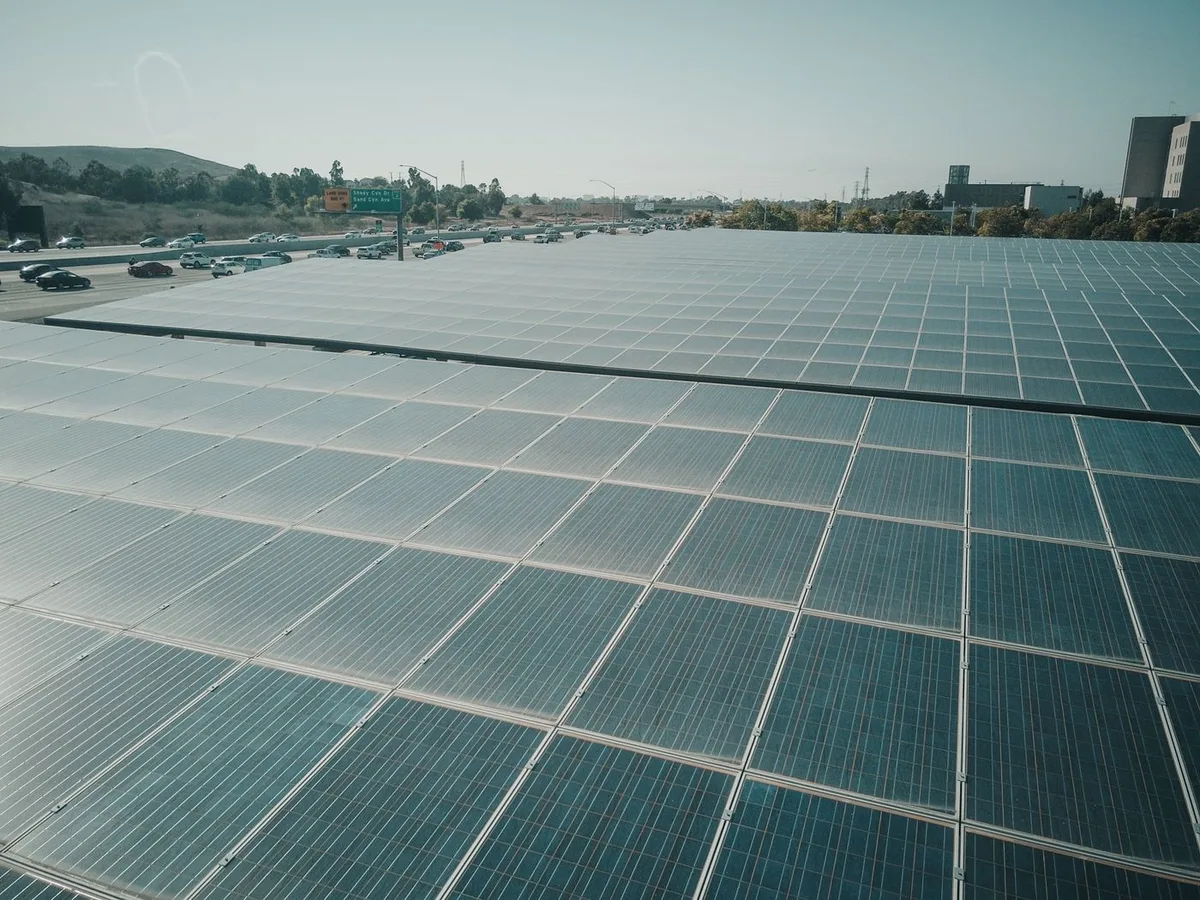 Sunlight falling across an array of solar panels
